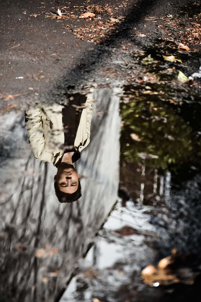 mobile wallpaper selective focus photography of reflection of man wearing gray jacket ford